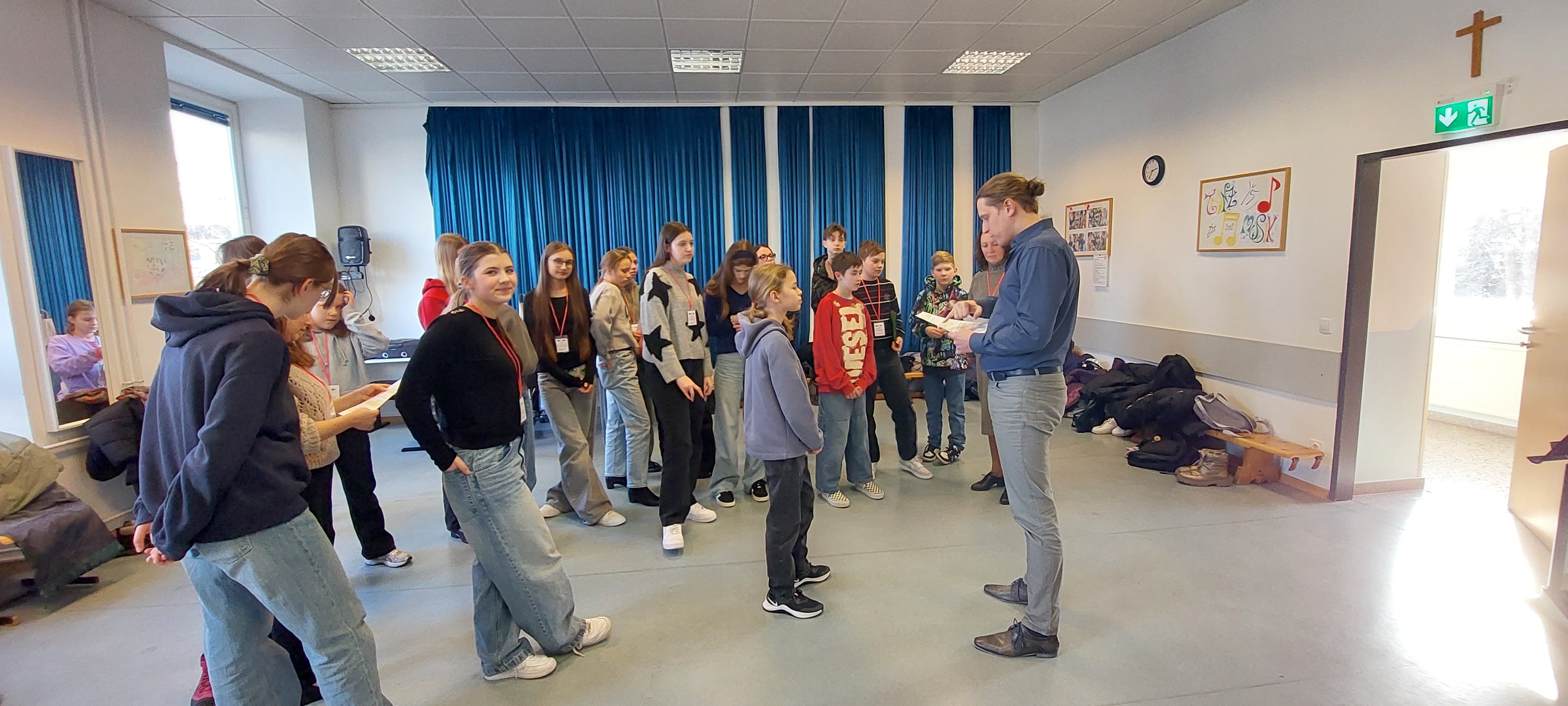 Students proudly displaying their certificates of completion
